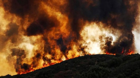 O incêndio, o sexto mais mortífero da história daquele estado americano, lavra desde 23 de Julho. FOTO Reuters