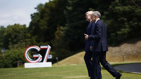 Mark Carney e Donald Trump durante a última reunião do G7, em Junho.&nbsp; Foto Arquivo/EPA/YOAN VALAT